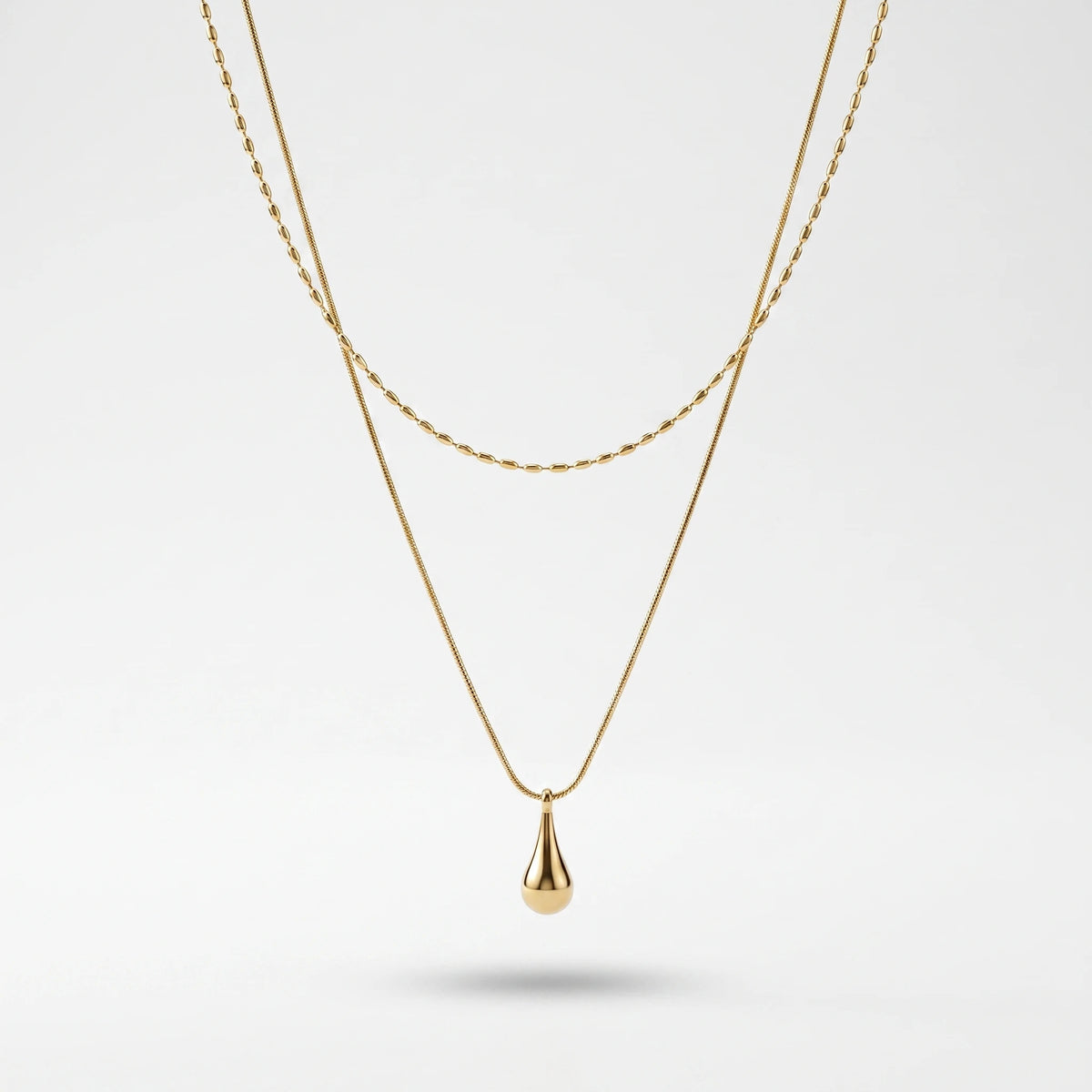 QIAOREN 13532 Double Layer Droplet Pendant Stack Necklace with Rice Bead & Thin Snake Chain, Smooth Teardrop Gold Charm
