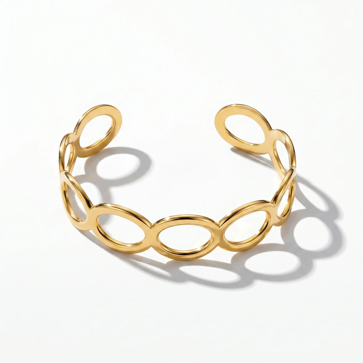 QIAOREN 12706 Minimalist Interlocked Ellipse Cutout Wide Cuff Bangle Hypoallergenic Stainless Steel Gold Bracelet Party Gift