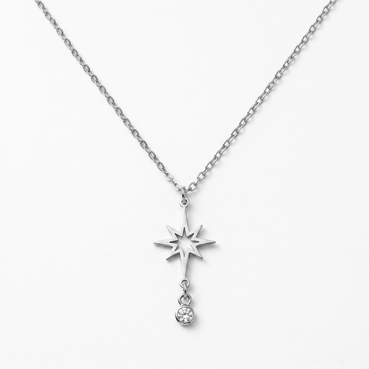 QIAOREN 11979 Wholesale 18K Gold Plated Stainless Steel North Star Pendant Necklace Hollow 8 Point Star with Dangle CZ Stone