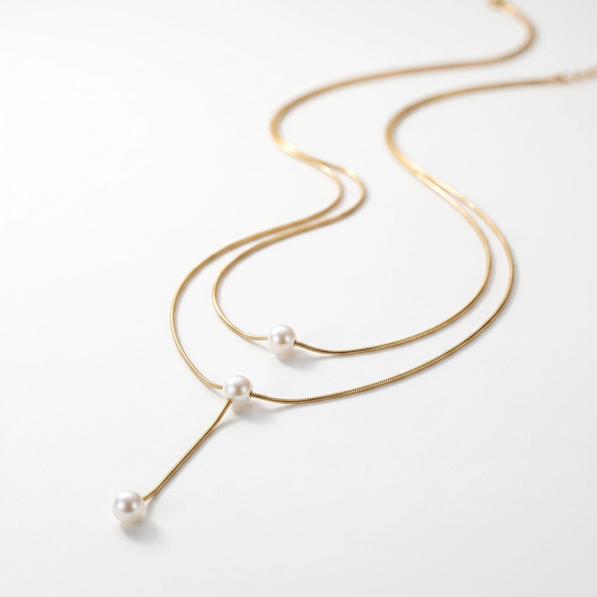 QIAOREN 13507 Double Layer Y Drop Pearl Pendant Necklace with Thin Snake Chain, Three Dangle Round Shell Pearl Charms Necklace