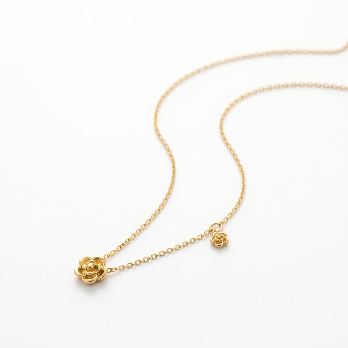 QIAOREN 13743 Thin Cable Chain Necklace with Two Hollow Layered Flower Charms Inlaid Single Round Clear Zircon Jewelry