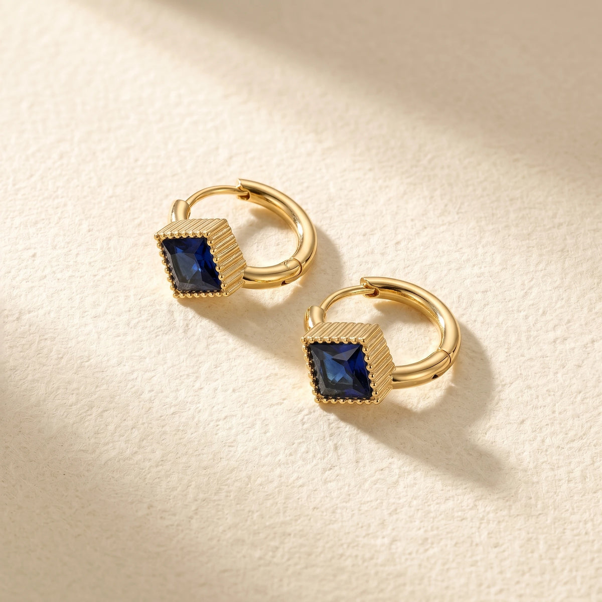 QIAOREN 12121-24 18K Gold Plated Stainless Steel Huggie Hoop Earrings Princess Cut Square CZ Inlaid Textured Bezel Ear Buckle